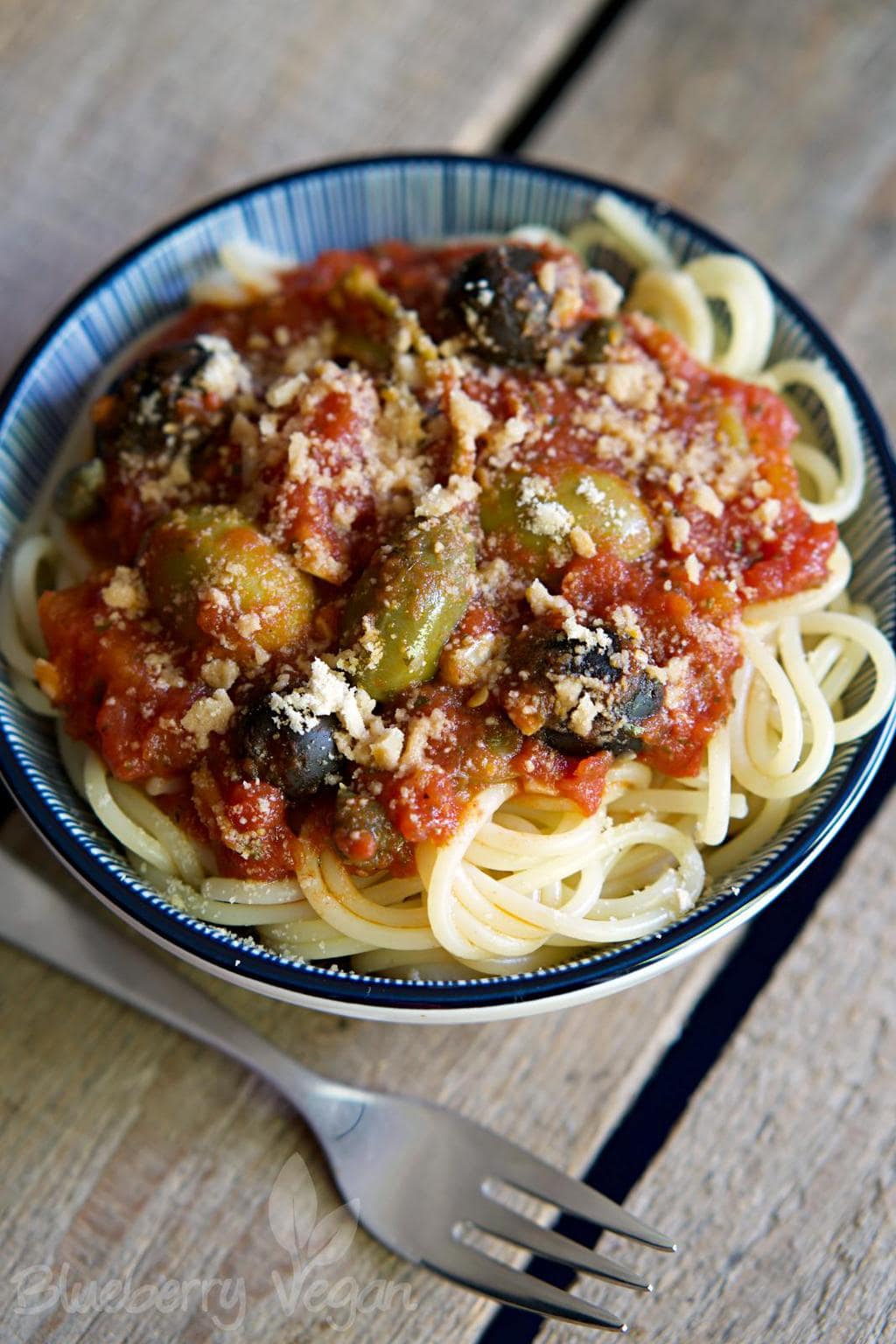 Spicy Spaghetti alla Puttanesca with Cashew Parmesan | Blueberry Vegan